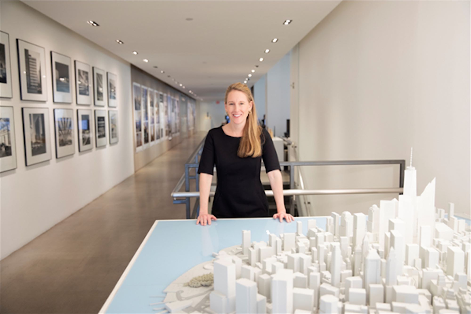 Woman with miniature city model